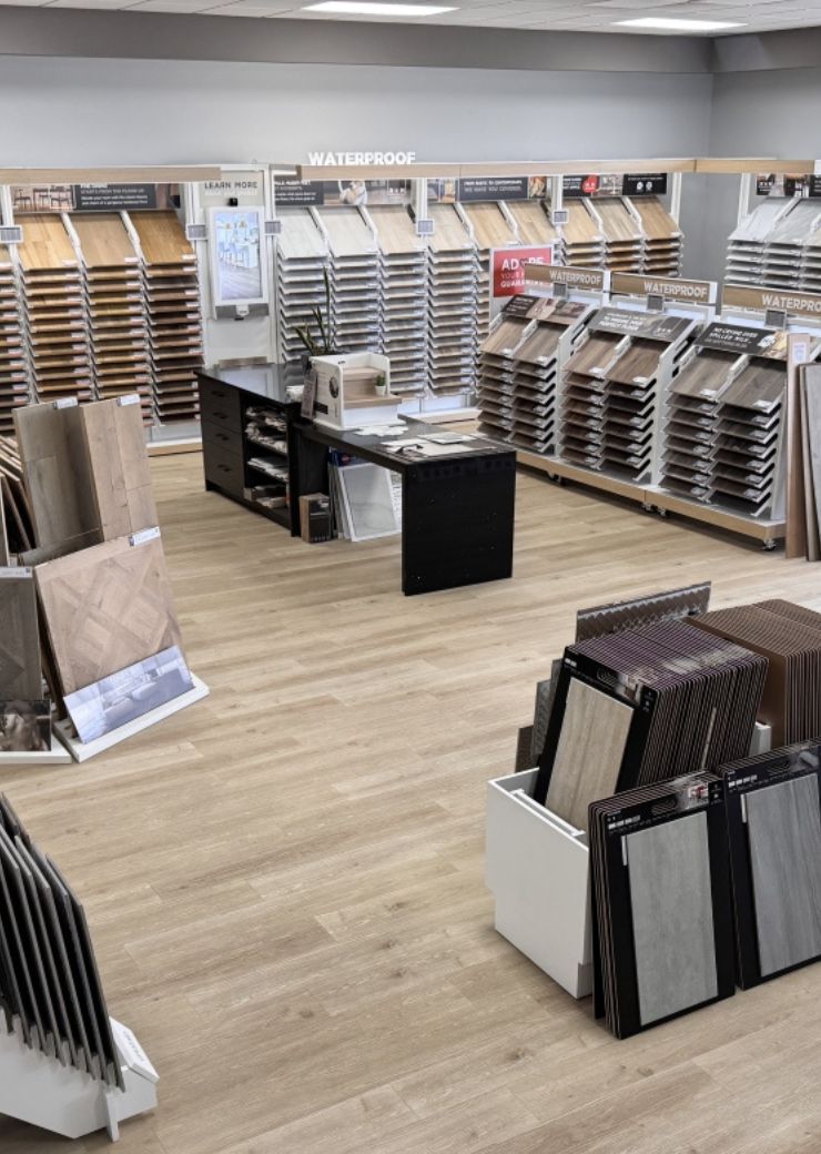 Mother and baby playing on a hardwood floor